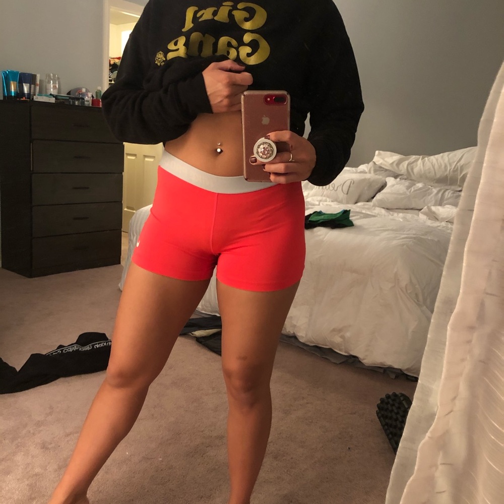 Neon coral Nike spandex shorts
